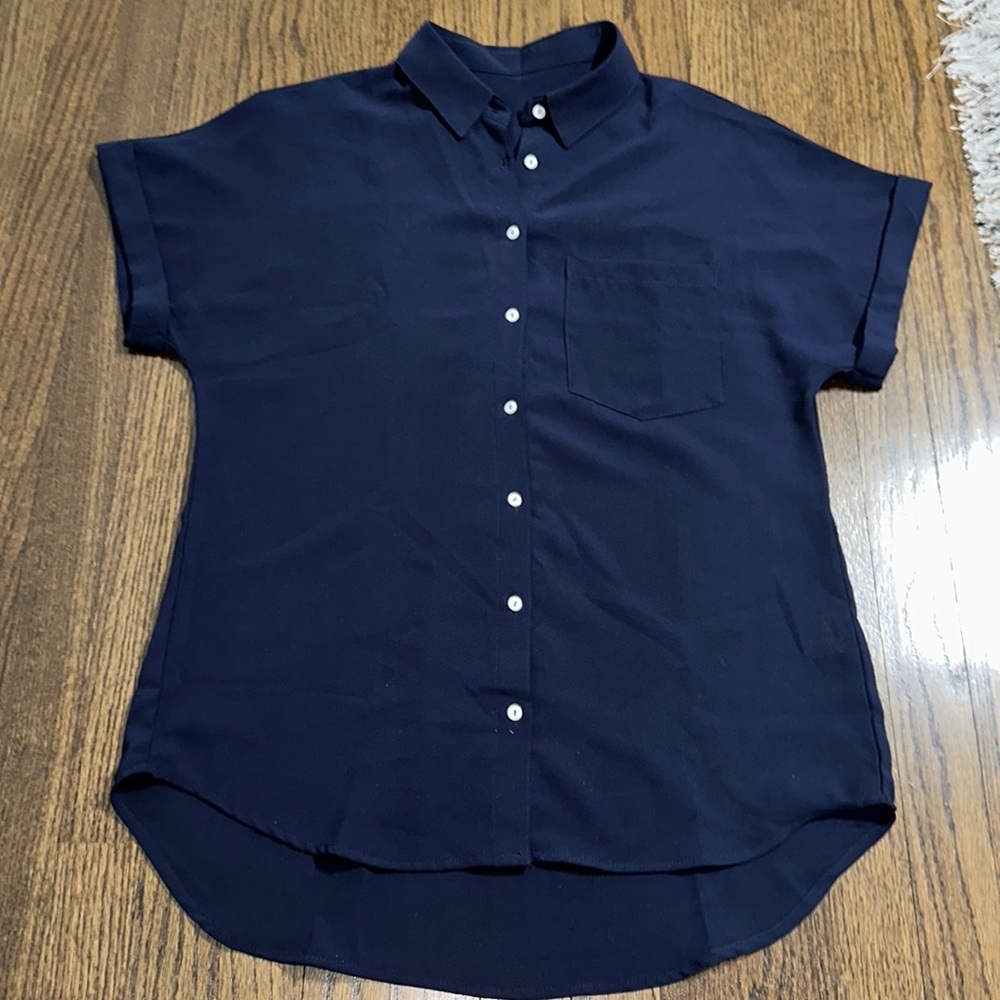 Navy Blue Women’s Button Down Shirt With Front Pocket And Slightly Hi Low Detail